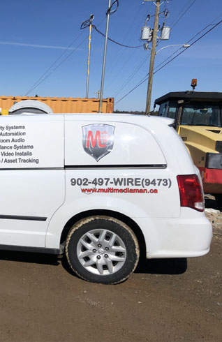 The Multi Media Man van with 902-497-WIRE on the side